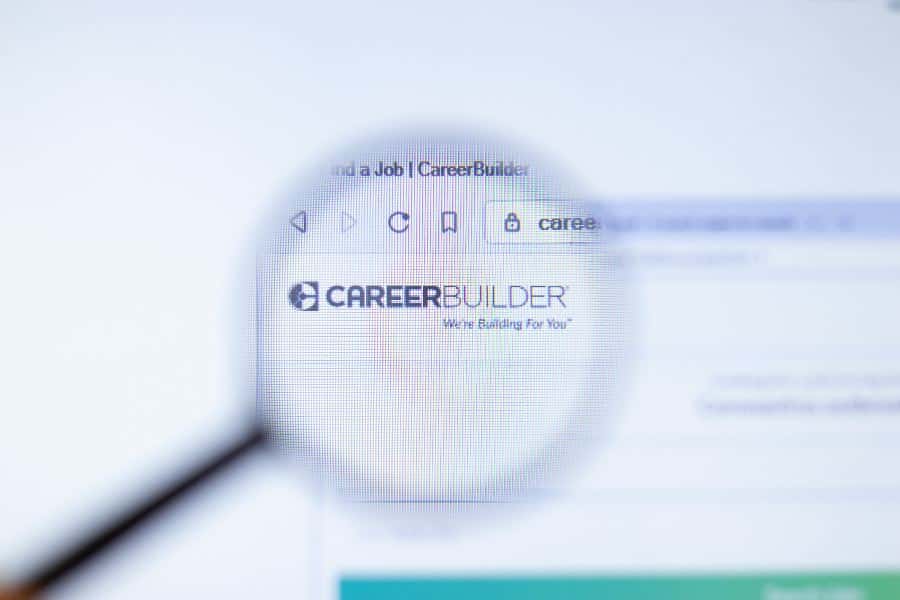 Using a magnifying glass on a CareerBuilder logo on screen.