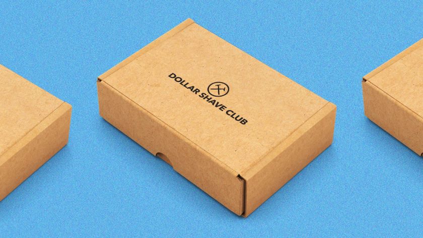 Dollar Shave Club box with logo on blue background.