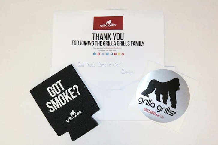 Handwritten thank you note branded koozie and decal.