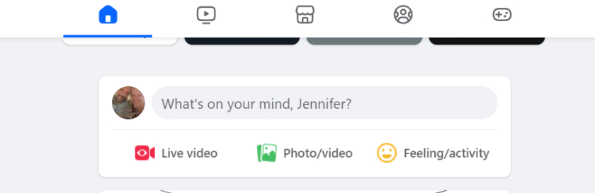 What's on your mind block for text, plus live video, photo, and activity buttons.
