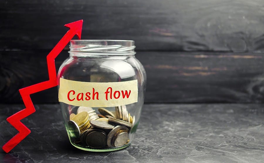 Jar of coins with label "cash flow."