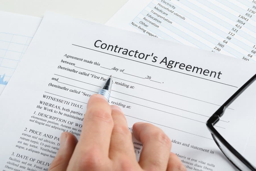 Signing contractor's agreement.