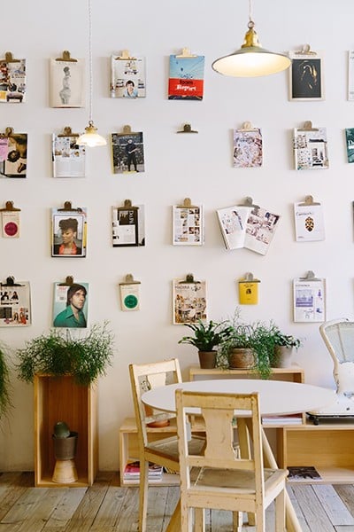 Home office with create pegs hanged on the wall