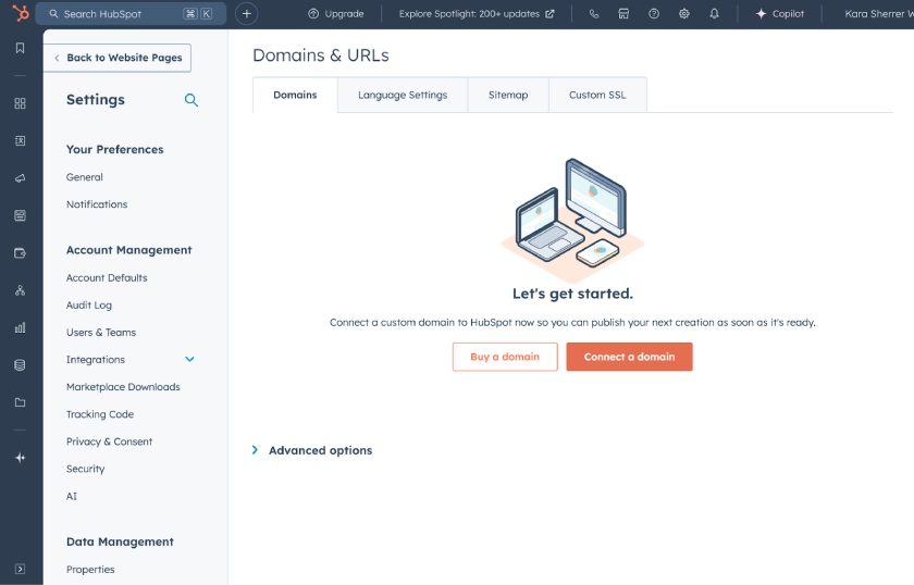 HubSpot's domains and URLs page with options to buy a domain or connect a domain.