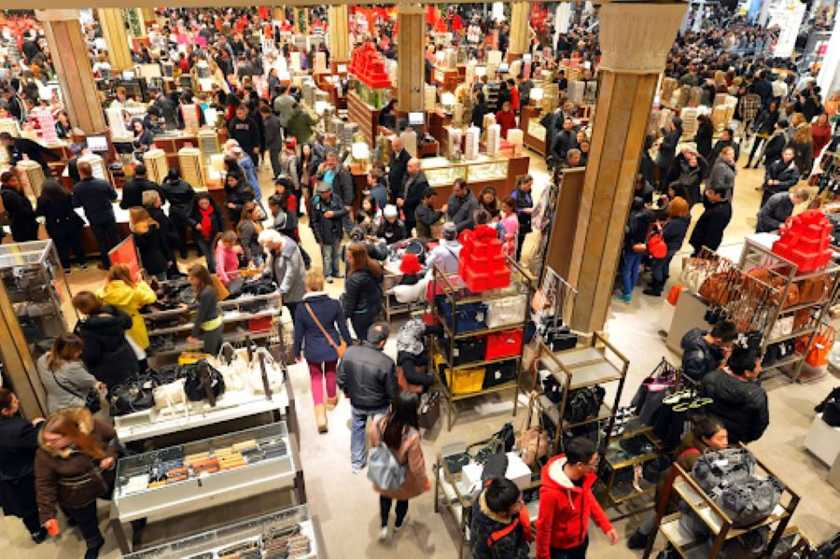 An aerial view of a crowded department store during the holidays.