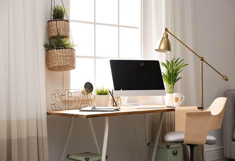 Home office with desk near a window