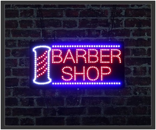 LED sign advertising a barber shop