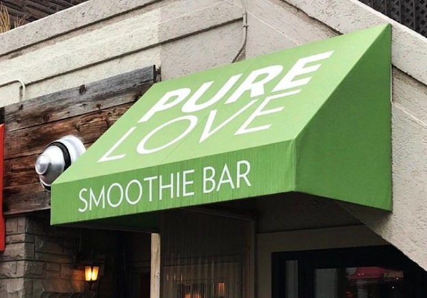 Awning sign advertising a smoothie bar