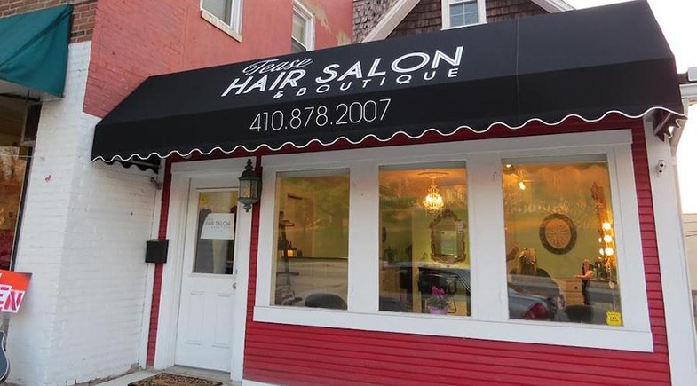 Awning sign above a hair salong