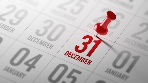 Calendar with pin drop on December 31.