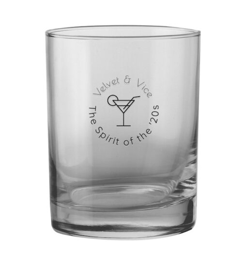 Branded shot glass for a 20s themed cocktail bar called Velvet & Vice with the logo in black showing a cocktail glass and the tagline "The Spirit of the '20s."