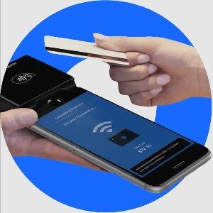 SpotOn tap tp pay card reader attached to a smartphone