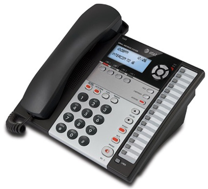 A black and white corded telephone with an "Intercom" text on its screen