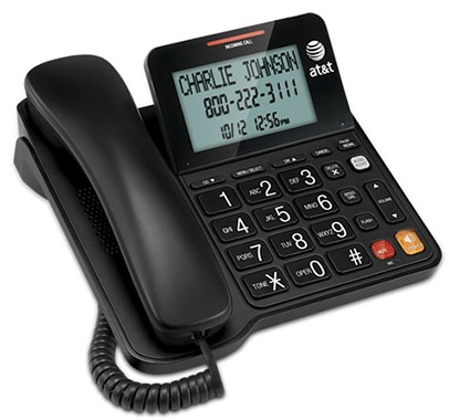 A black corded telephone that displays "Charlie Johnson" on its screen