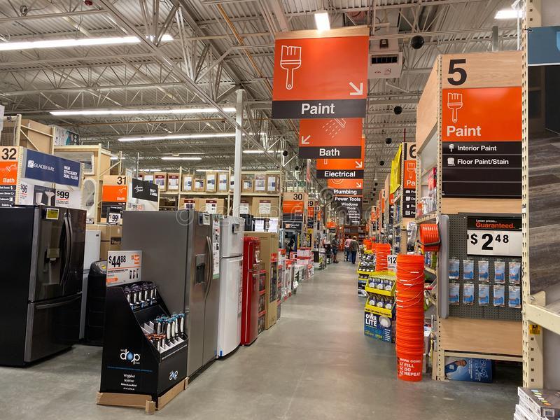 Store aisle signs in a hardware store.