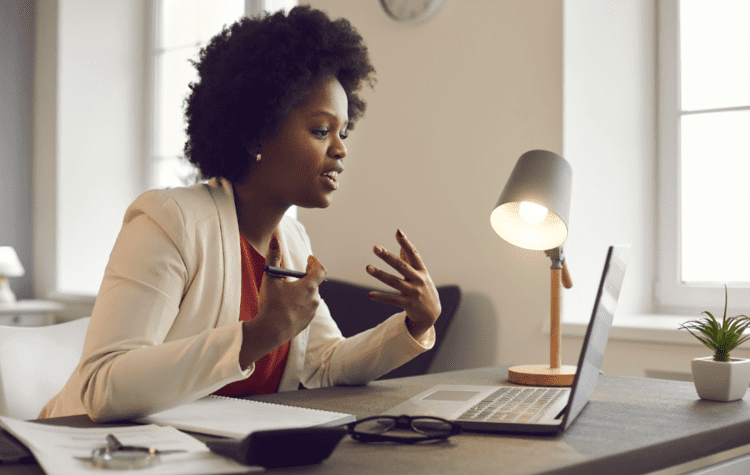 woman in business suit on a video conferencing call