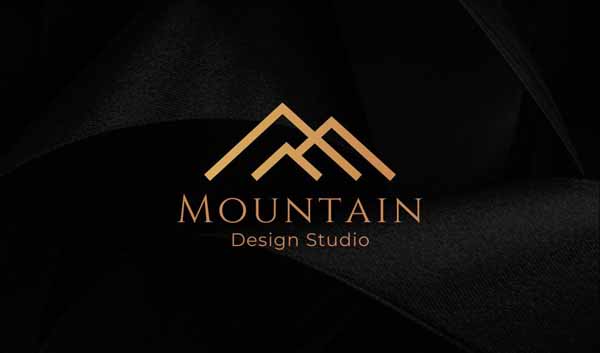 Black and gold mountain business card with business information