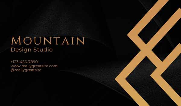 Black and gold mountain business card with business information