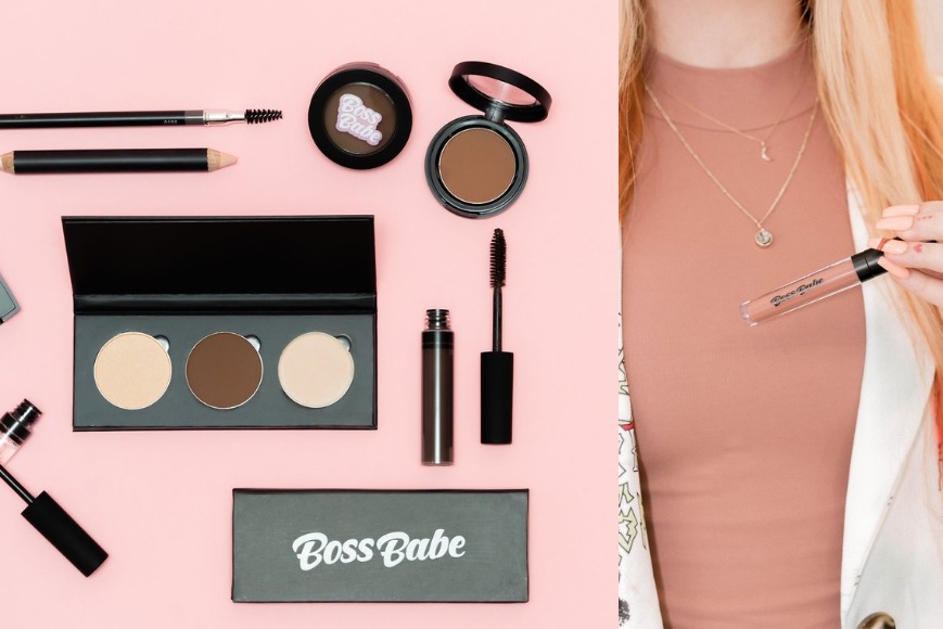 A variety of cosmetic items with the logo 'Boss Babe' spread out on a pink background next to a cropped image of a woman holding a tube of lip gloss.