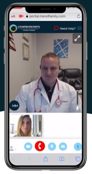 Mend telehealth appointment on mobile app view with a doctor and patient talking via video conference.