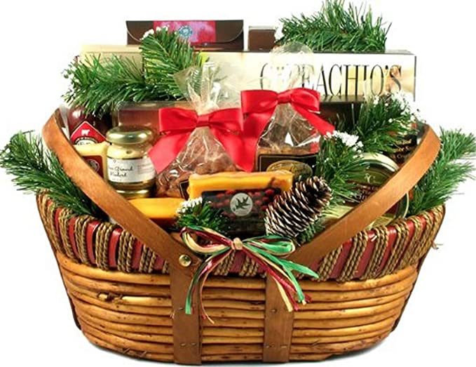 A gift basket with cheeses, nuts, and candies decorated with pine cones and ribbon.