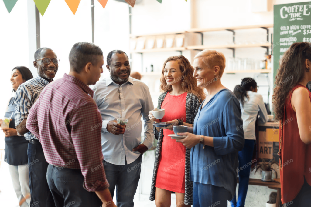 People standing and chatting at a coffee shop