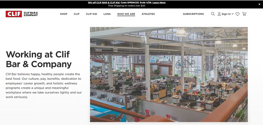 Clif Bar & Company's career page showing an open office space with bikes hanging from ceiling racks.