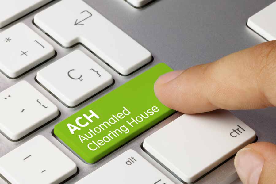 ACH (automated clearing house) in green keyboard keys.