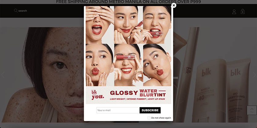 cosmetics splash page example by BLK with newsletter CTA and product promotion