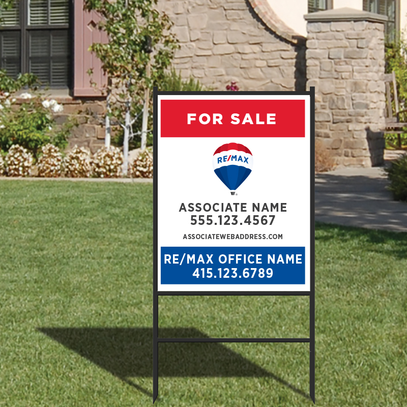 A real estate company-branded for sale sign.