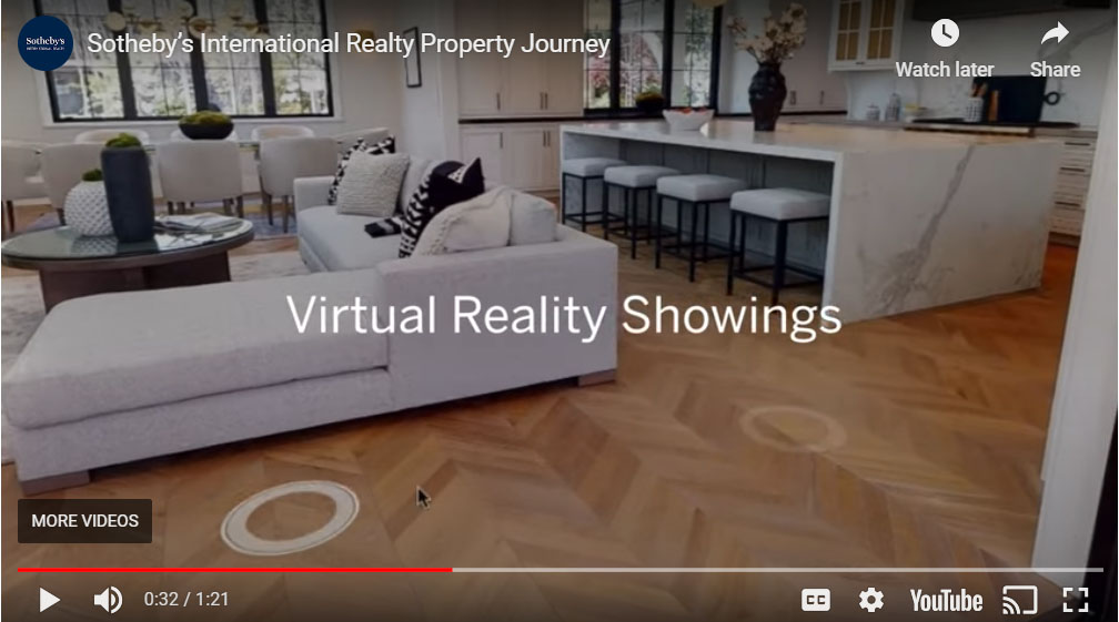 Picture showing virtual reality tour from open kitchen to living room with circles on the floor to move through the home.