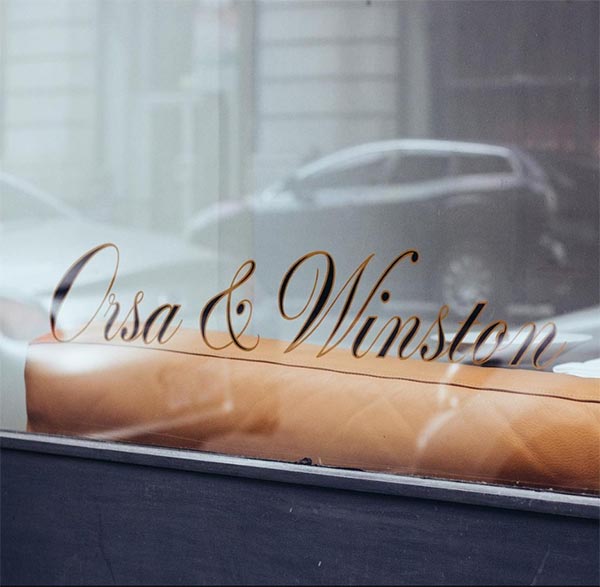 Exterior window of Orsa and Winston restaurant.