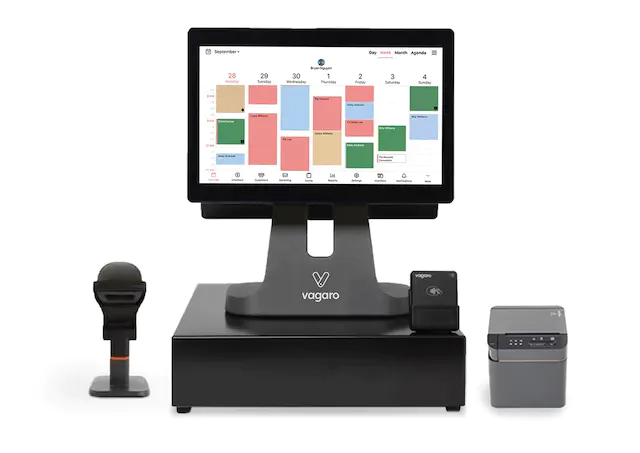 Vagaro POS system with terminal, cash drawer, scanner, and receipt printer.