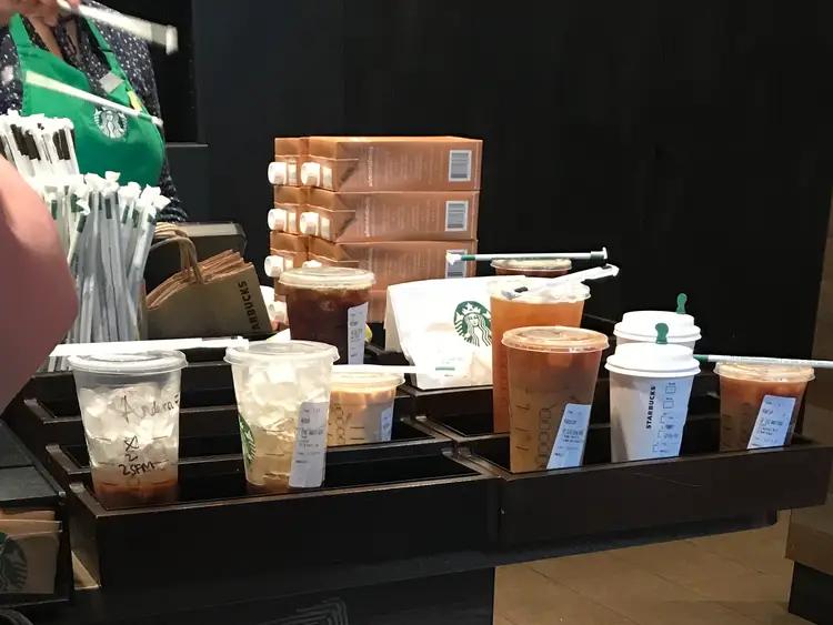 Starbucks orders in a designated area for customers to pick up