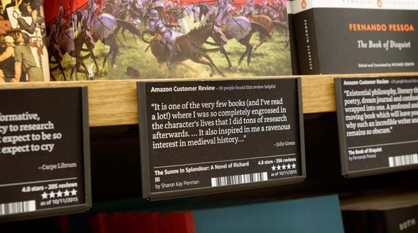 Bookstore shelf with customer review on the product tag.