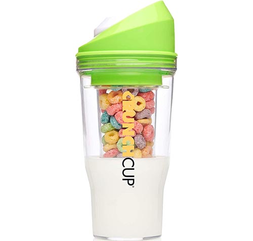 Portable cereal cup with a green lid on white background with Fruit Loops and milk.