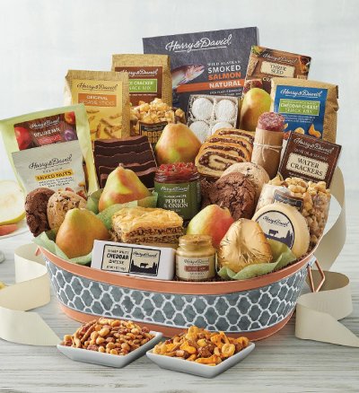 A gourmet food basket from Harry & David with treats, fruits, and nuts.