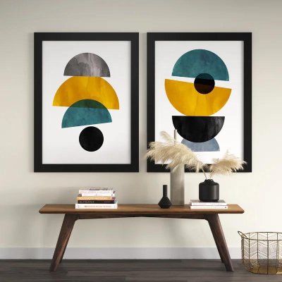 Abstract wall art featuring hues of yellow, blue, black and grey.