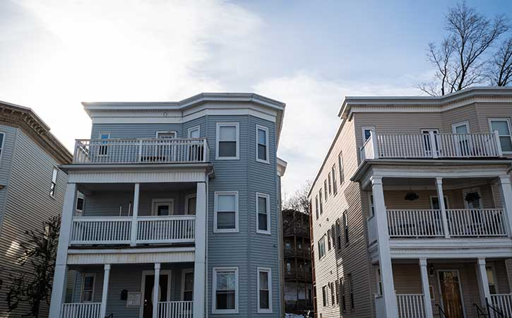 Three-story triplex rental properties.
