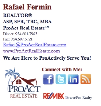 Example real estate email signature showing designations.
