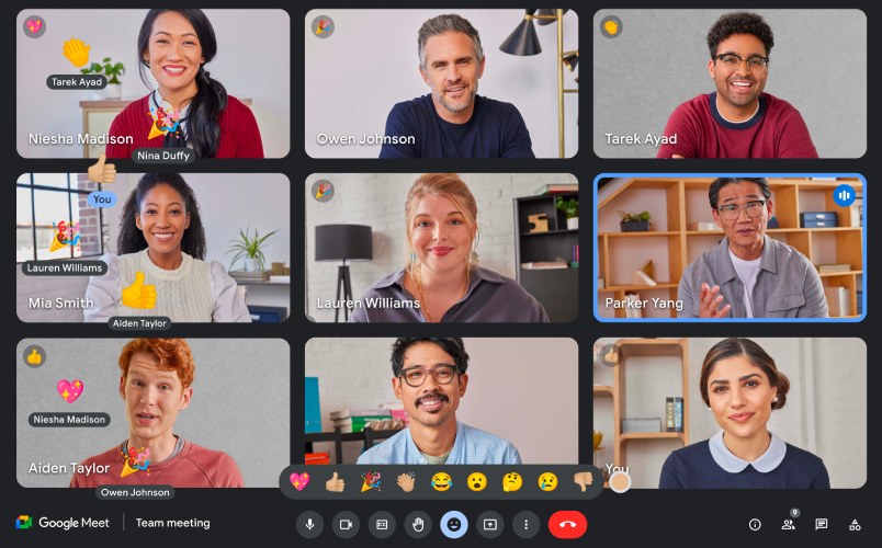 A screenshot of Google Meet participants using emoji reactions.