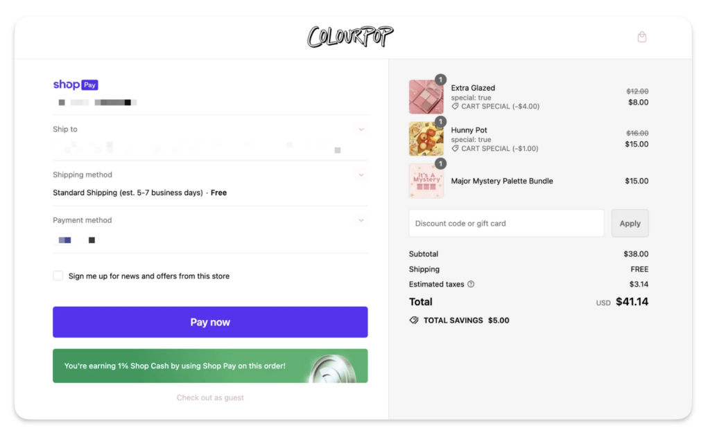 Shopify checkout page with sample products, total cost, and payment button.
