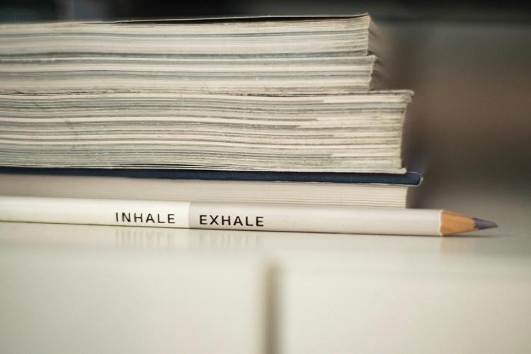 Pencil that says "inhale, exhale".