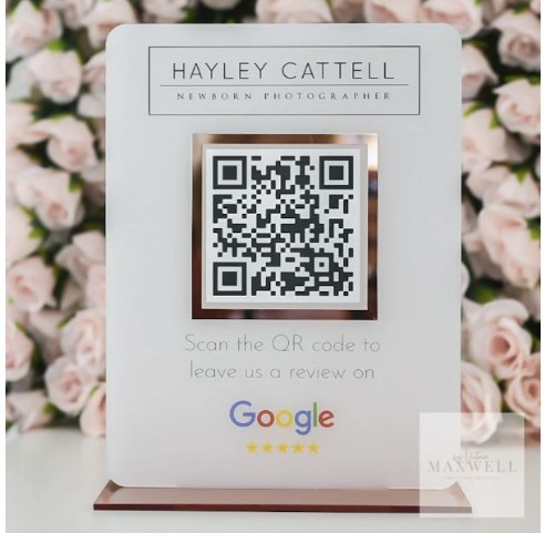 QR code inside a small business prompting customer reviews