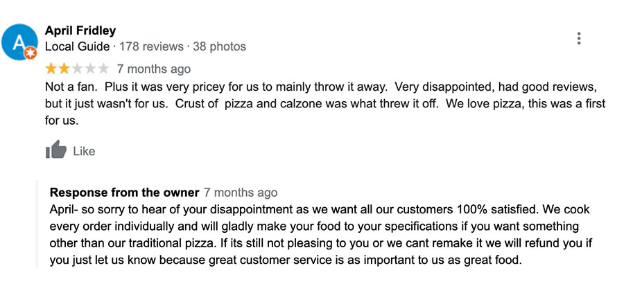 Customer review of a restaurant with a response from the owner.