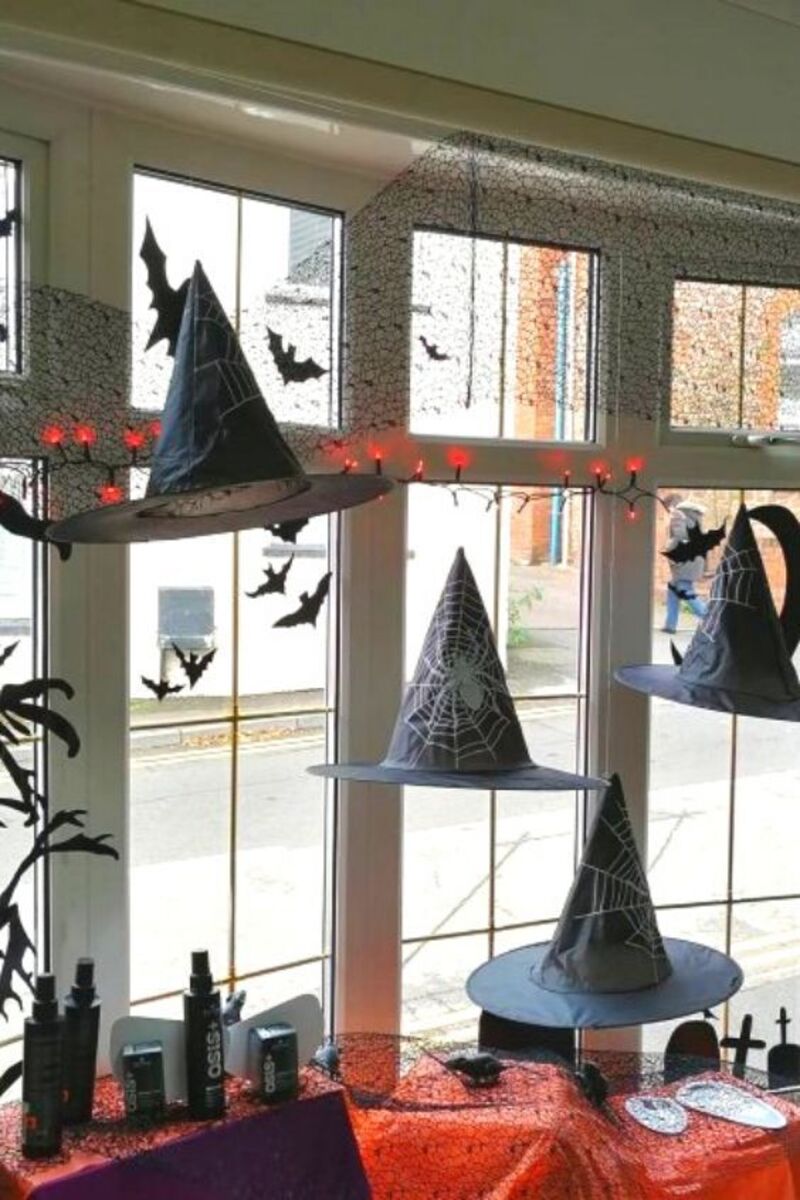 Halloween window display witch hats