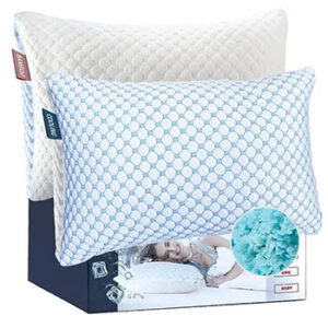 Two pillows featuring a quilted outer texture next to a box with a sleeping model printed on it.
