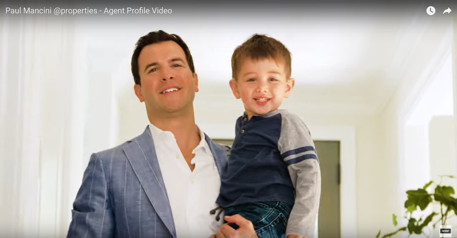 A screenshot of a real estate agent video showing the agent and his son.