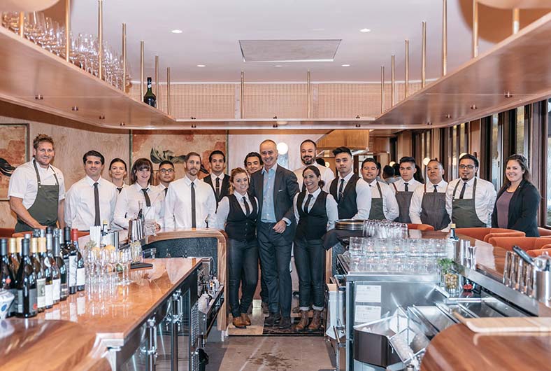 Group of staff at a fine dining restaurant.