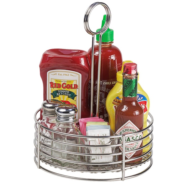 Condiment caddy carrying different types of condiments.
